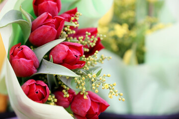 Bouquets of red tulips, spring flowers in the flower shop