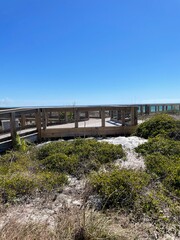 Fototapeta na wymiar Public wooden walkway at Henderson Beach State Park Florida 