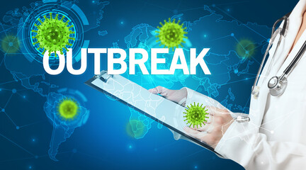 Doctor fills out medical record with OUTBREAK inscription, virology concept