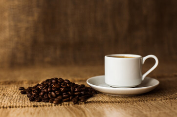 Coffee beans and white cup, espresso