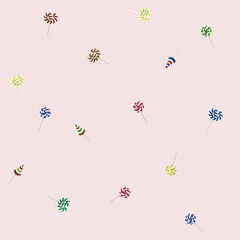 Seamless pattern of multicolored caramels in vector