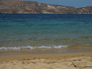 Golden sandy beach in bay on Serifos island, Cyclades, Greece