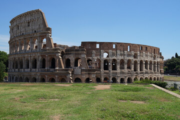 Fototapeta na wymiar Ancient Roman amphitheater and gladiator arena Colosseum ruins, heart of Roman Empire, famous tourist landmark, guided tour concept, Rome, Italy
