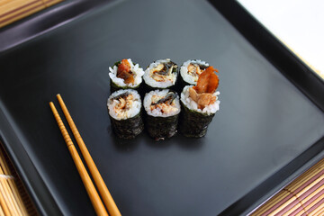 colorful dish of homemade fish sushi