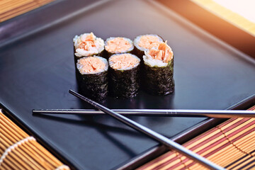 handmade fish sushi with rice served in an appetizing way