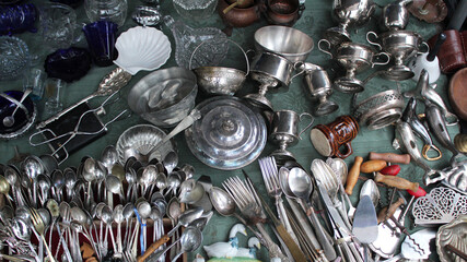 Different household items at an antique market.