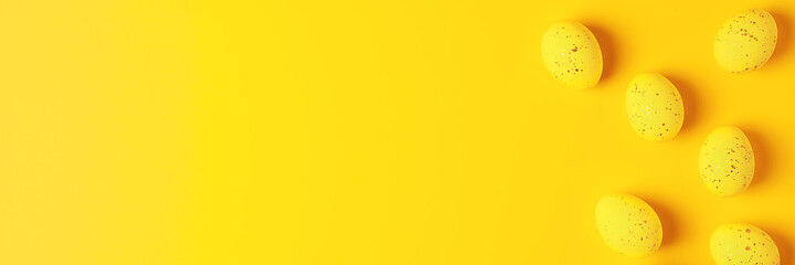 Easter yellow eggs on a yellow background. Flat lay, copy space.