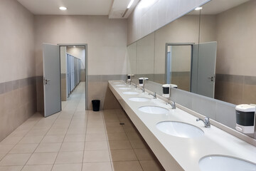 Fototapeta na wymiar sinks in the office toilet