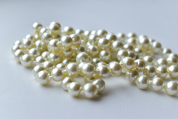 Yellow beautiful beads necklace on white background