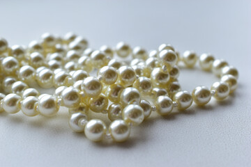 Yellow beautiful beads necklace on white background