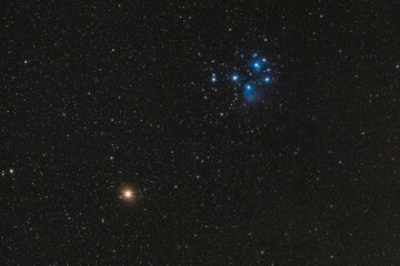 The red planet Mars and the Pleiades in the constellation Taurus, photographed on March 6th, 2021.