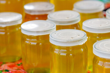 jars of honey on the surface for sale