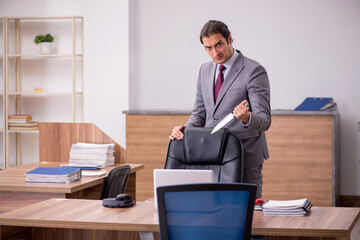 Fototapeta premium Young businessman employee in bullying concept in the office