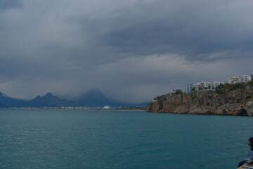 sea and mountains with foggy weather