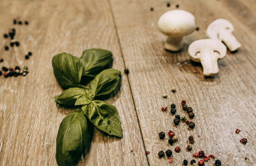 Basil leaves and sliced mushrooms