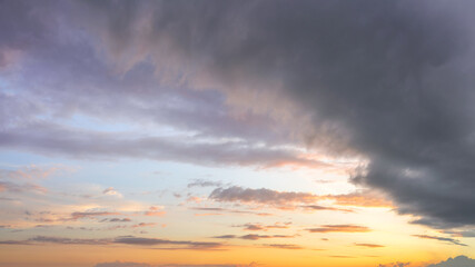 Natural background: dramatic stormy sky at sunset