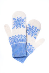 Warm woolen knitted mittens isolated on white background. Blue k