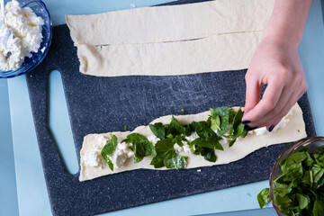 Cheese spinach pie. Salty cake recipe. Step by step. View from above. The girl is cooking. Step 9 © Дарья Сахарова