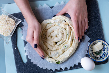 Cheese spinach pie. Salty cake recipe. Step by step. View from above. The girl is cooking. Step 16 © Дарья Сахарова