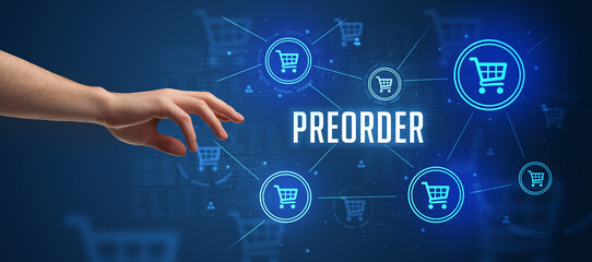 Obraz premium Close-Up of cropped hand pointing at PREORDER inscription, online shopping concept
