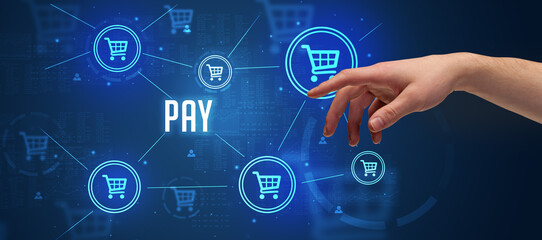 Close-Up of cropped hand pointing at PAY inscription, online shopping concept