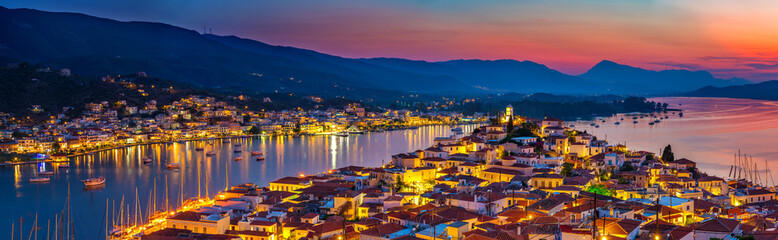Fototapeta premium Panoramic view of greek town Poros at sunset, Greece