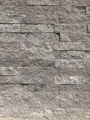 texture of a gray wall of artificial stone