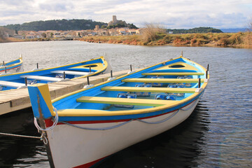 Naklejka premium Beautiful wooden boats in Gruissan, a seaside resort in the Aude department, France