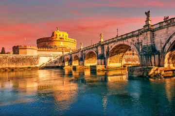 Saint Angel Castle and bridge over the Tiber river in Rome at sunrise