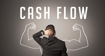 Rear view of a businessman with CASH FLOW inscription, powerfull business concept