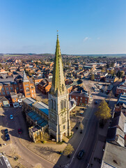 A panorama aerial view looking down the High Street and across the central square in the town of Market Harborough, UK in springtime © Nicola