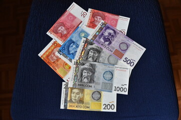 a current money of kirguistan with selective focus