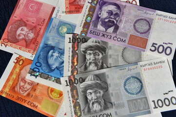 a current money of kirguistan with selective focus