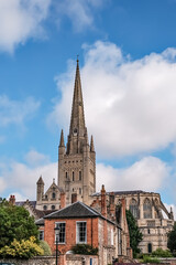 Norwich, Norfolk, UK - July 26 2020. An editorial photo of Norwich cathedral captured on a bright and sunny day