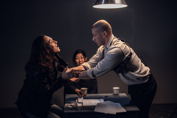 A police investigator beats up an arrested man without witnesses to get a confession