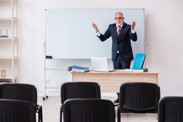 Old male business couch in the classroom during pandemic