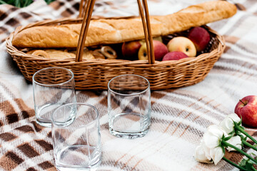 Composition for a picnic on a beige blanket