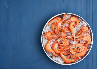 Raw red shrimps on ice