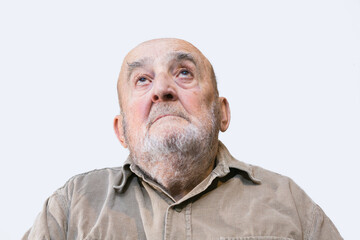 senior man looking above isolated on white background