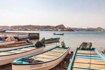 Fototapeta na wymiar Fishing boats on the beach in the harbor of Sur, Oman.