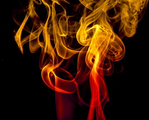 Colored smoke on black background