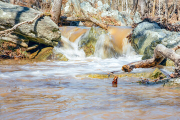 A small cascade at the Great Falls of the Potomac River in early spring .C&O Canal National Historical Park.Maryland.USA