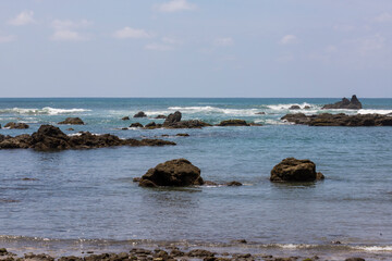Fototapeta na wymiar Landscape of a stony coast located in the Corcovado national park, Osa, Costa Rica.