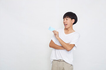 Asian man showing credit card