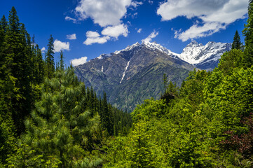 Landscape in the mountains. This is the scenic view of the Himalayas. Peaks and alpine landscape from the trail of Sar Pass trek Himalayan region of Kasol, Himachal Pradesh, India.