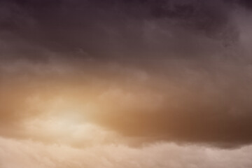 sky with black Brown clouds beginning of storm