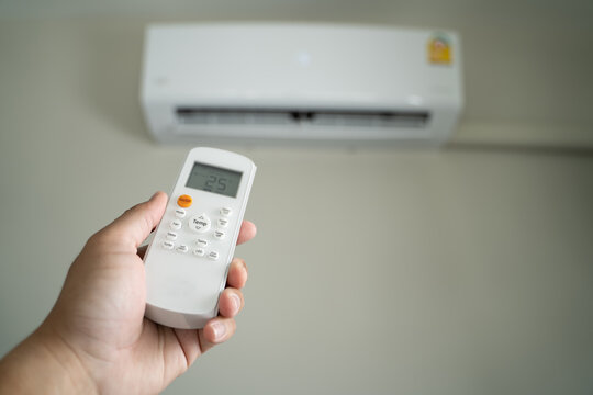 Air Conditioner Inside Top The Room Man Operating Remote Controller Open Air Conditioner Energy Savings