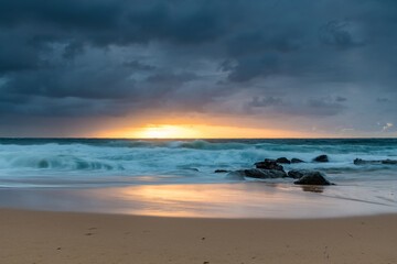 A moody overcast sunrise seascape