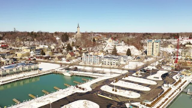 Aerial view of town of Port Washington, Wisconsin. Daytime, sunny sky, winter