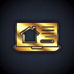 Gold Online real estate house on laptop icon isolated on black background. Home loan concept, rent, buy, buying a property. Vector.